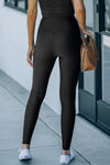 Schwarze enge Leggings mit hohem Bund und Taillenmieder